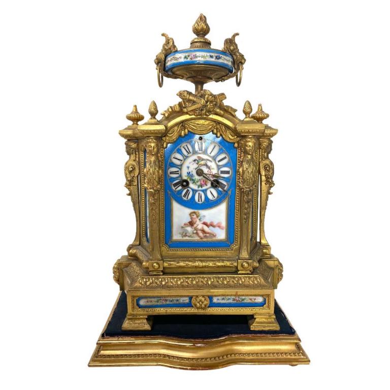 French Antique Bronze Clock, Sevres Blue Porcelain: French P. H. Mourey Sevres Clock . French Antique Bronze Clock, Sevres Blue Porcelain Clock. With Key clock and pendulum. Measures 14 inches high x 9 inches wide x 5 inches deep. Sir John Bennett Ltd.