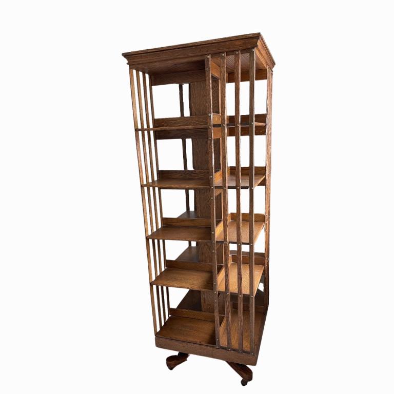 19th Century Tall Wooden Swivel Shelves: 20th Century Tall Wooden Swivel Shelves. Measures 67.5 inches high x 22 inches wide x 22 inches deep.