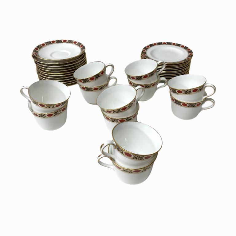 (36) Piece Royal Crown Derby Ambassador China: (36) Piece Royal Crown Derby Ambassador China tea cups, saucers, and plates. Made in England. Set includes 12 tea cups, 12 saucers, and 12 plates. Each is signed at the bottom.