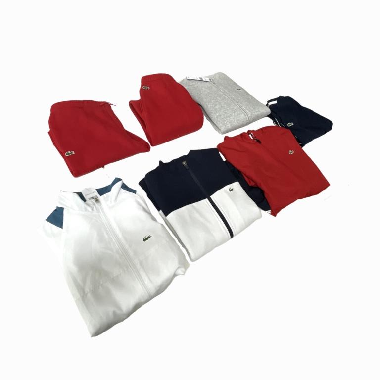 Collection of Lacoste Kids Sport Clothing: Collection of Lacoste Kids Sport Clothing. 3 Pairs of Jogger Pants, Size 14A. 2 Pairs of Zip Up Jackets, Size 14A. 2 Pairs of Windbreakers, Size 14A.
