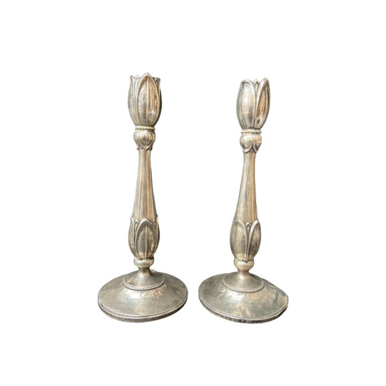 Pair of Fisher Sterling Weighted 8004 Candelabras: Pair of Fisher Sterling Weighted 8004 Candelabras. Marked. Measures 9.5 inches high x 4 inches in diameter.