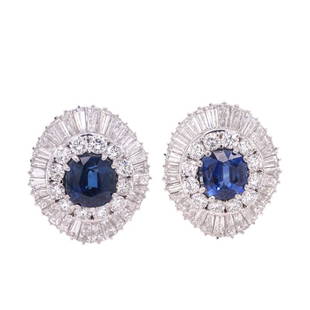 9.00ct Sapphire And 20.00ct Diamond Earrings: 9.00ct Sapphire And 20.00ct Diamond Earrings. Set In Platinum. (2) Two Blue Cushion Modified Sapphire. Approx Weight. 20.00ct Diamond. Clarity E-G. VVS1-VS1. Measures 1 1/2 inch length. 024338