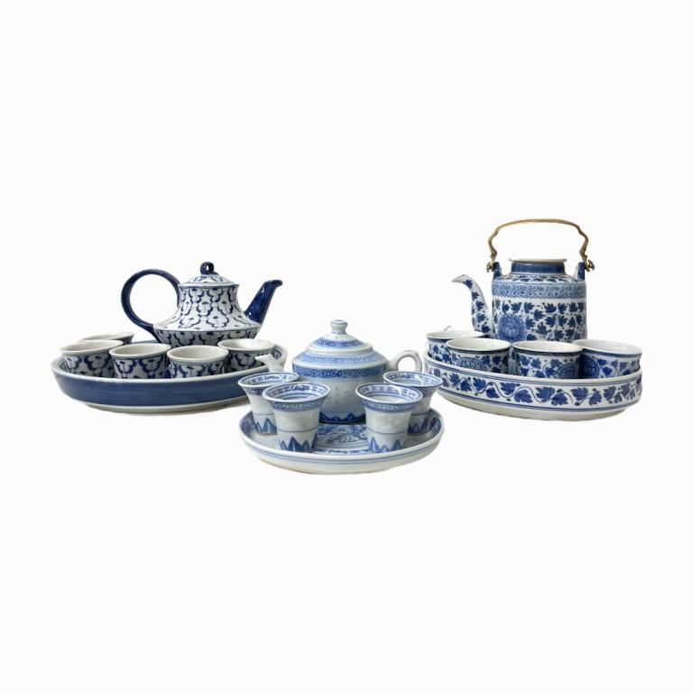 Lot of 3 Chinese Blue and White Porcelain Tea Sets: 3 Vintage blue and white Chinese porcelain sets. The biggest tea set has a pot that measures 4" inches high and the tray has 9" inches of diameter; the second set has a pot that measures 5" inches hig