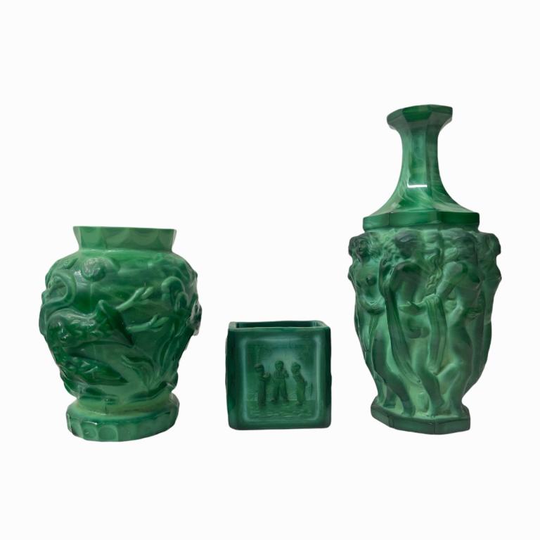Lot of 3 Art Deco Bohemian Malachite Glass Vases: A lot of 3 Art Deco Bohemian malachite glass vases. One having a raised nude females design. the other with raised ram and bird design and lastly a cigarette vase depicting smoking children. Tallest m