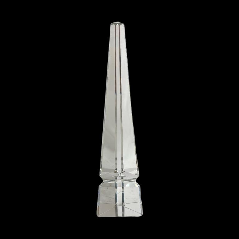 Clear Crystal Obelisk Phallic Desk Sculpture: Clear crystal obelish phallic desk sculpture. No apparent marks. Measures approx. 14 3/8" height. Appears in overall good condition.