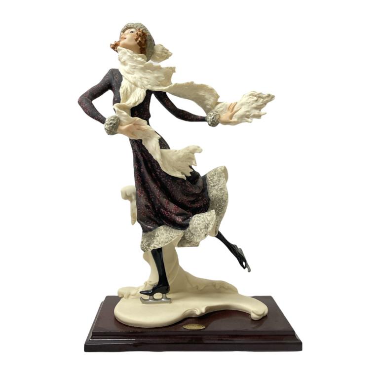 Giuseppe Armani "Skating Winter" Sculpture 0542C: Giuseppe Armani Italian porcelain sculpture titled "Skating Winter" number 0542C. Measures approx. 15" height. Includes original box. Appears in overall good condition.