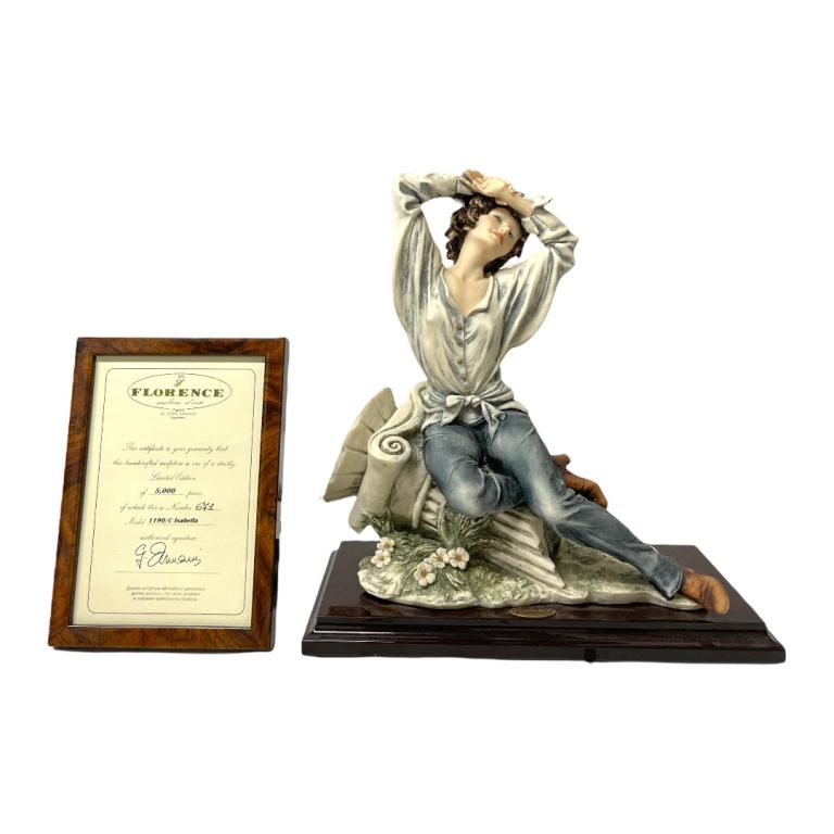 Giuseppe Armani "Isabella" Sculpture 1190C: Giuseppe Armani Italian porcelain sculpture titled "Isabella" number 1190C. Measures approx. 11" height. Includes original box. Appears in overall good condition.