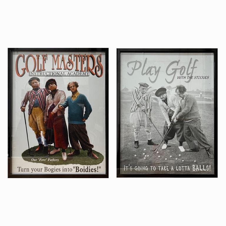 2 "The Three Stooges" Golfing Poster Prints Frame: A lot of 2 "The Three Stooges" poster printgs having a golf sports theme. Each mounted in matching black tone metal frames behind glass screens. Each measures approx. 16 1/4" height x 12 3/4" width ov