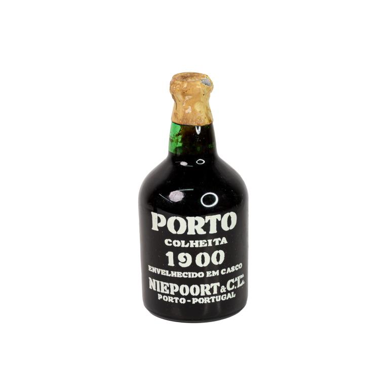 Niepoort Colheita 1900 Porto Port Wine 700mL Seale: Niepoort Colheita 1900 Port Wine bottle approx. 700mL. Bottle is sealed and was kept in cellar. Some wear to wax seal cover.