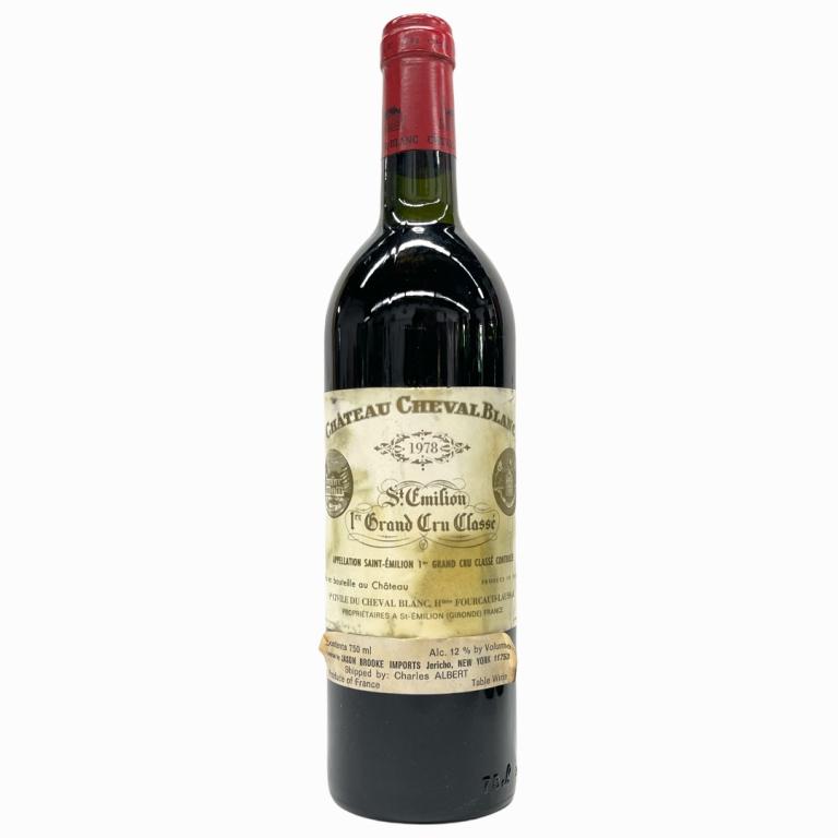 1978 St. Emilion Grand Cru Classe Chateau 750mL: 1978 Saint Emillion French Grand Cru Classe Chateau wine in 750mL bottle. Sealed and kept in cellar. Some wear to labels. Has Sotheby's label on side.