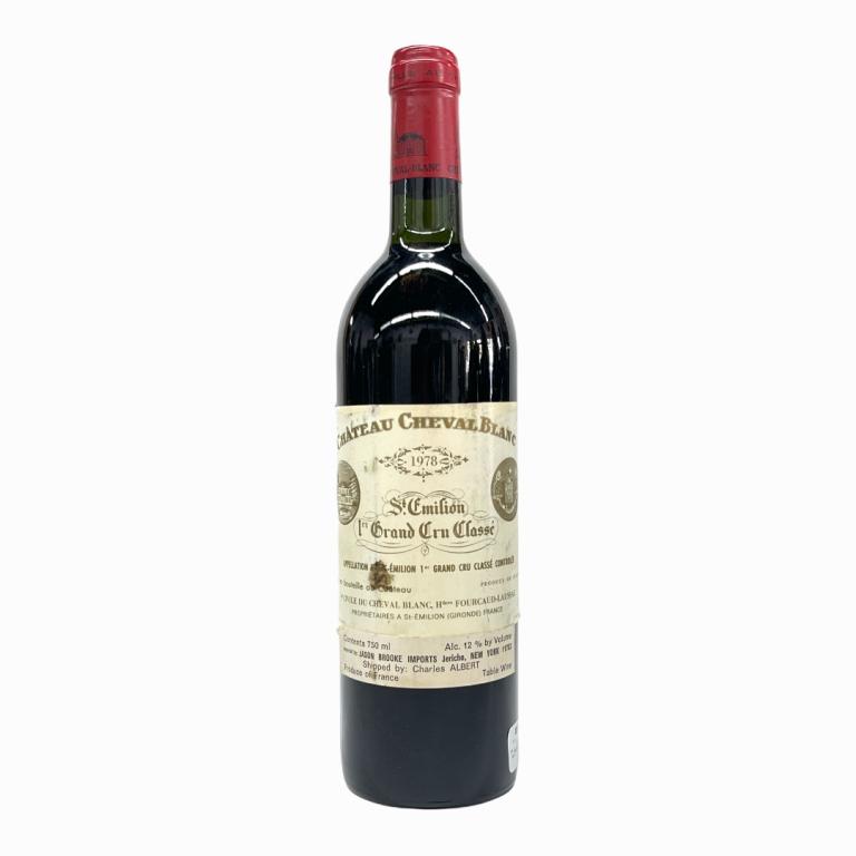 1978 St. Emilion Grand Cru Classe Chateau 750mL: 1978 Saint Emillion French Grand Cru Classe Chateau wine in 750mL bottle. Sealed and kept in cellar. Some wear to labels. Has Sotheby's label on side.