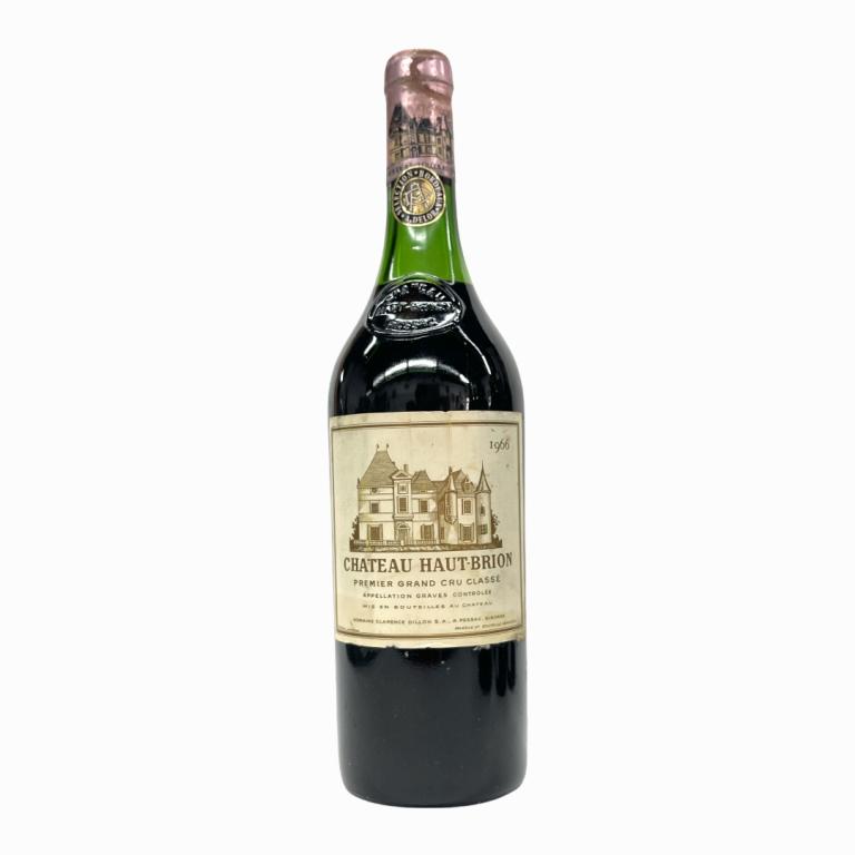 1959 Chateau Haut-Brion Grand Cru 750mL Wine: 1966 French Chateau Haut-Brion Grand Cru wine in 750mL bottle. Sealed and kept in storage. High shoulder fill. Some wear to labels and seal cover. Has Sotheby's label to side.