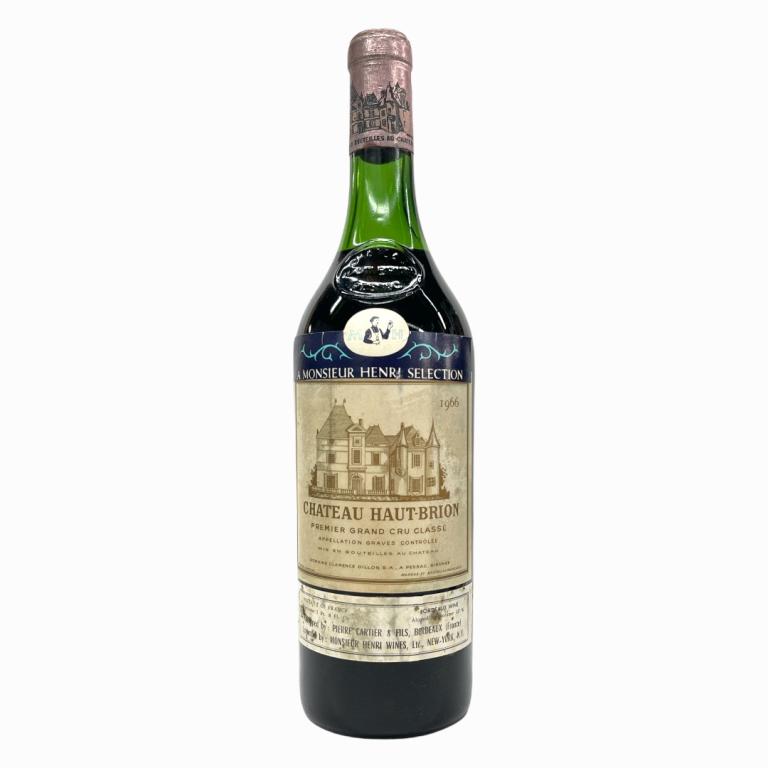 1966 Chateau Haut-Brion Grand Cru 750mL Wine: 1966 French Chateau Haut-Brion Grand Cru wine in 750mL bottle. Sealed and kept in storage. Mid shoulder fill. Some wear to labels and seal cover.
