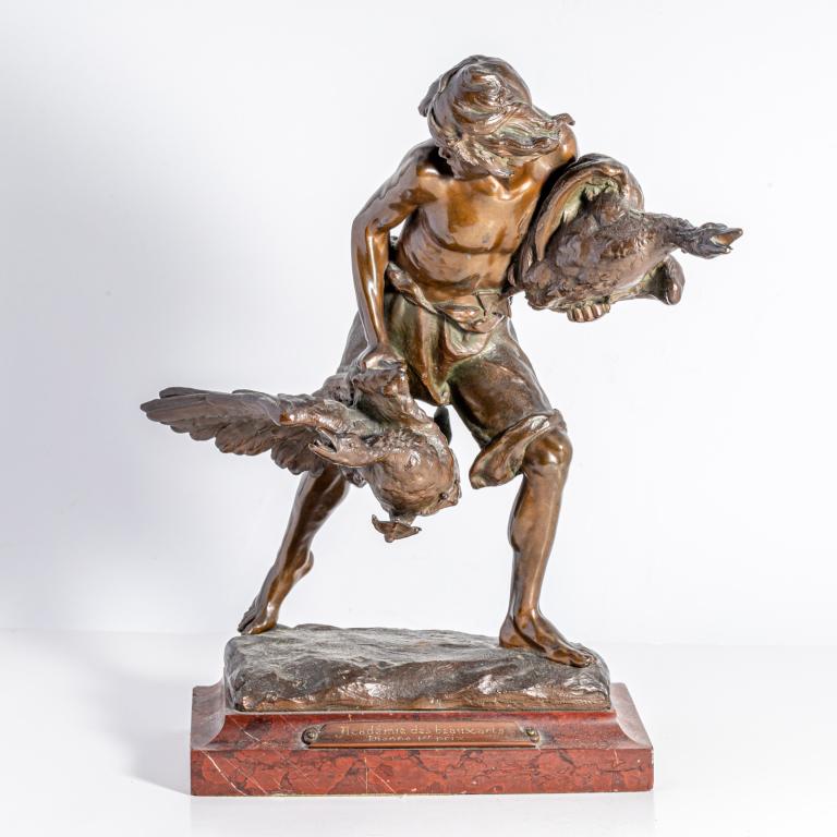Gyula Jankovits Beaux Art "Flight" Bronze Sculptur: Gyula Jankovits (HUNGARIAN, Born 1865) bronze sculpture titled "Flight" depicting a boy carrying geese. Signed to verso of bronze base. Mounted on a red marble base with Beaux Arts Academy placard. Me