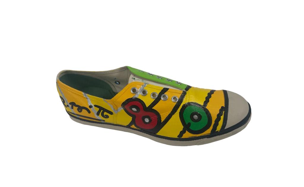 Romero Britto (BRAZILIAN / UNITED STATES / FLORIDA, born 1936) mixed media acrylic painted Lacoste: Romero Britto (BRAZILIAN / UNITED STATES / FLORIDA, born 1936) mixed media acrylic painted Lacoste shoe titled "David, Eighty Years, Just The Beginning" ececuted circa 2013. Includes certificate of au