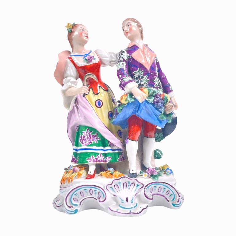 Antique Sitzendorf German porcelain group sculpture depicting a man and woman with a fruits harvest (1 of 4)