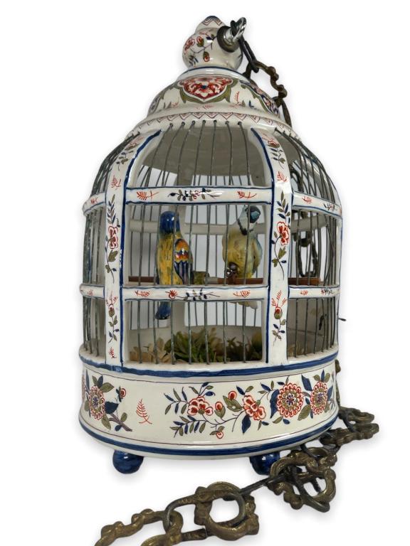 A vintage French faience porcelain figural bird cage with hand painted blue and red floral designs (1 of 8)