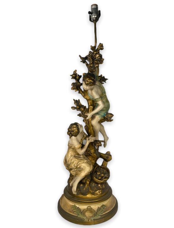 After L. F. Moreau, a large cold painted French metal group sculpture depicting a man and woman (1 of 4)