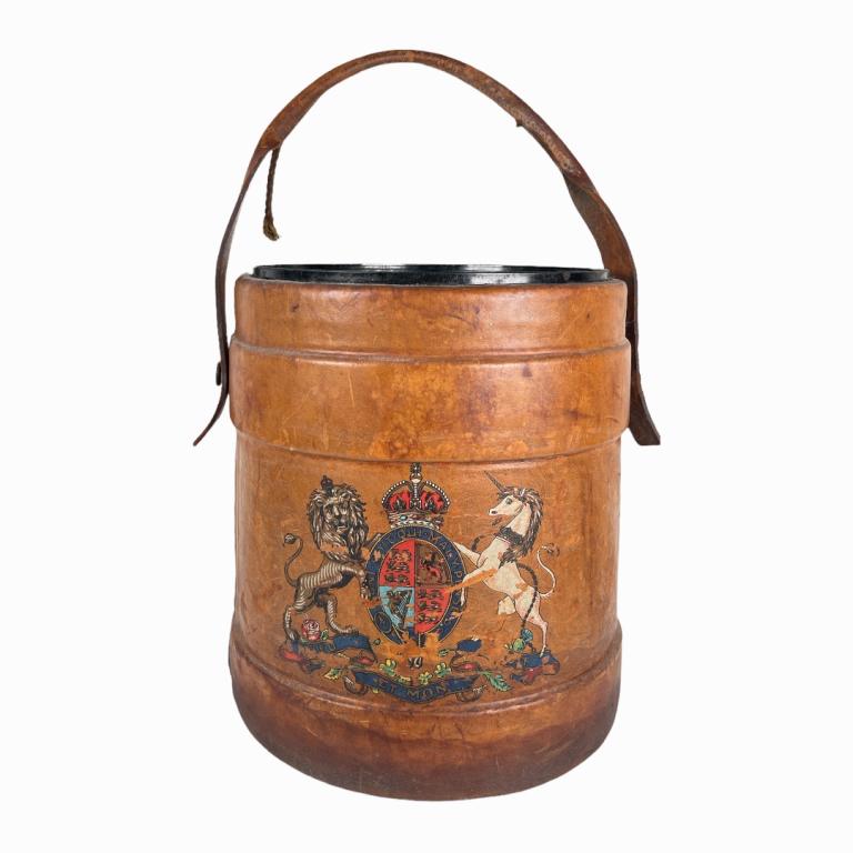 An antique leather lined wooden bucket with handle. Has painted heraldic crest design to front (1 of 3)