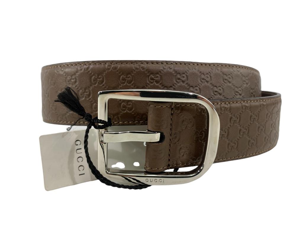 Gucci Micro Guccissima Brown Leather Men's Belt: # 43 Item:Gucci Micro Guccissima Brown Leather Men's Belt Designer:GUCCI Condition:A Color:Brown Hardware Color:Silver Material:Leather Accesories:Dust Bag Serial Number: Strap Drop / Handle Length/Wa