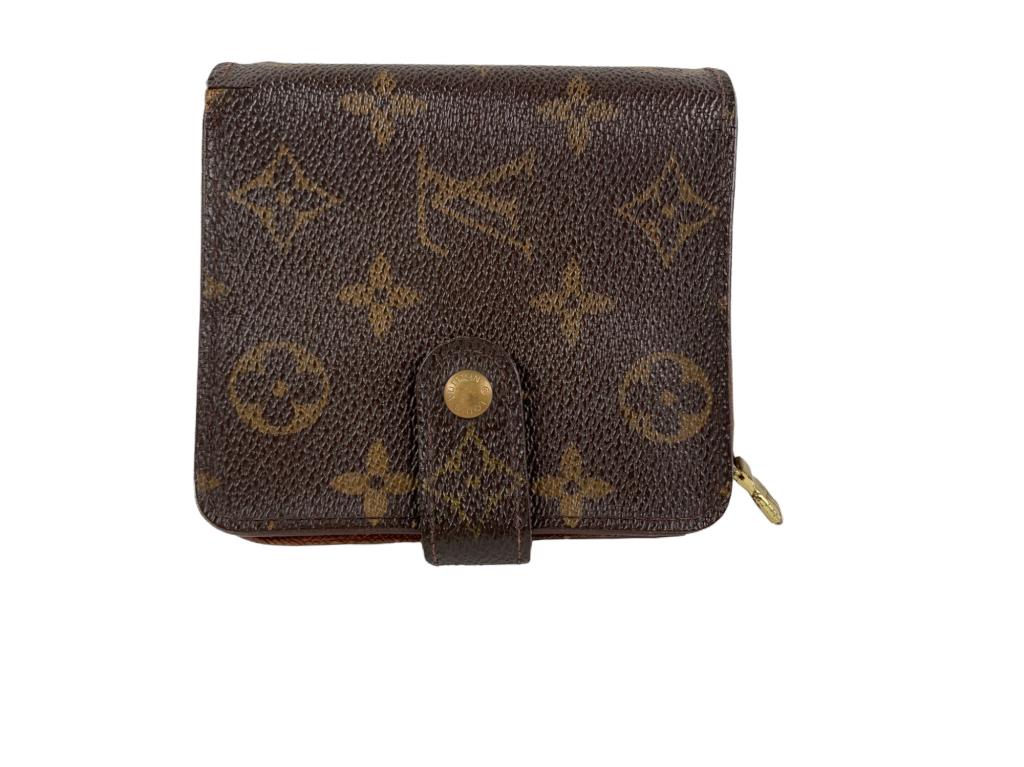 Louis Vuitton Folding Wallet with snap: #: 240 Item:Louis Vuitton Folding Wallet with snap Designer:LOUIS VUITTON Condition:C Color:Brown Hardware Color:Gold Material:Coated Canvas Accesories:N/A Serial Number:N/A Strap Drop / Handle Length