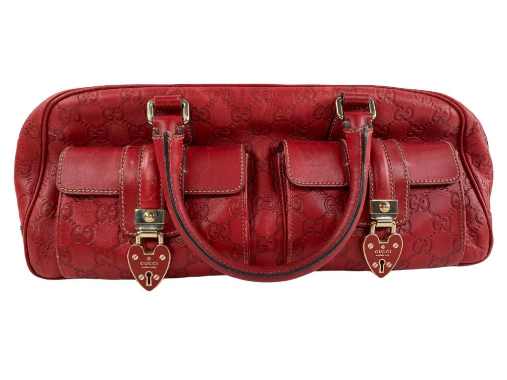 Gucci Joy Red Heart Boston Bag: #: 332 Item:Gucci Joy Red Heart Boston Bag Designer:GUCCI Condition:B Color:Red Hardware Color:Silver Material:Leather Accesories:N/A Serial Number:N/A Strap Drop / Handle Length/Waist:5 Weight (lbs):