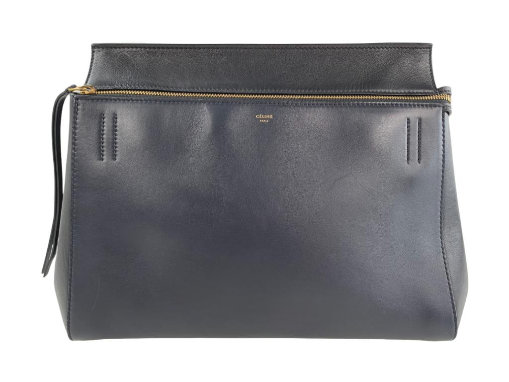 Celine Edge Leather Hand Bag Navy Blue: #: 689 Item:Celine Edge Leather Hand Bag Navy Blue Designer:CELINE Condition:AB Color:Navy Hardware Color:Gold Material:Leather Accesories:N/A Serial Number:N/A Strap Drop / Handle Length/Waist:HL: 7