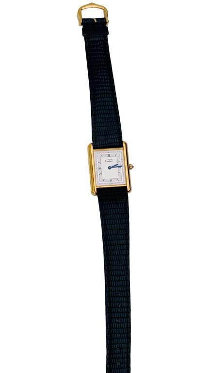 Mens Cartier Quartz Watch: Mens Cartier Quartz Watch. Leather Band. measures 9 1/8 inches length