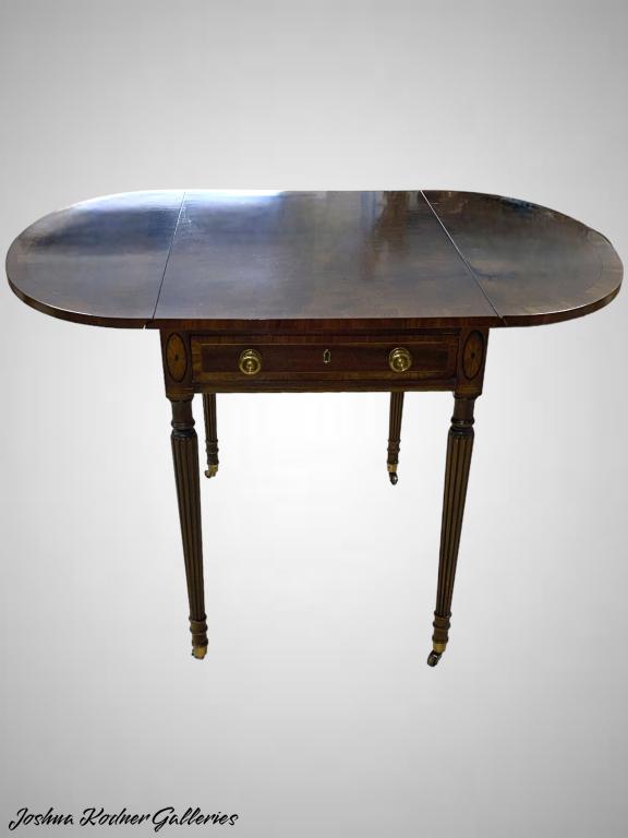 AN ENGLISH TEA/FOLDING TABLE WITH WHEELS (1 of 5)