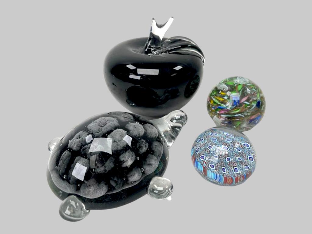 Group Of Murano Glass Art: Group Of 4 Murano Art, fist piece is a Glass turtle in black and white signed on the bottle of the turtle, second piece is a black glass peach, third piece is a round Murano glass with amazing colors 