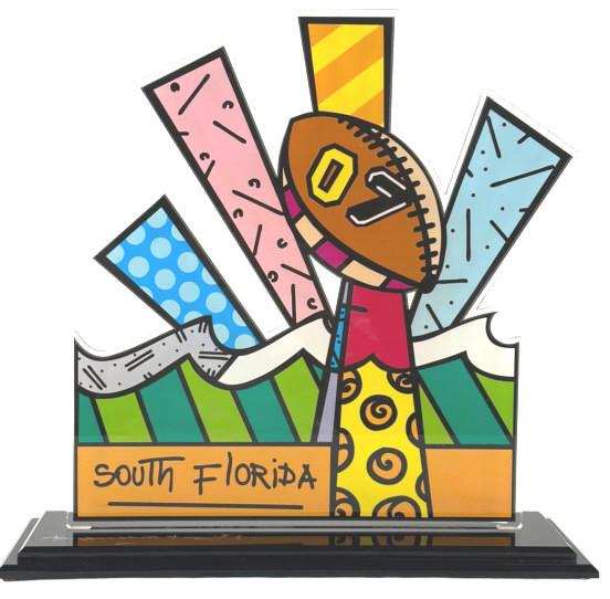 Romero Britto (Brazilian, b 1963) Mixed media sculpture featuring a multicolored depiction of the: Romero Britto (Brazilian, b 1963) Mixed media sculpture featuring a multicolored depiction of the 2007 Super Bowl displayed on a black acrylic base. Signed at base: "Romero Britto" CIRCA: 2007 ORIGIN: