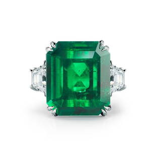 COLOMBIAN EMERALD RING WITH DIAMOND: COLOMBIAN EMERALD RING WITH DIAMOND A simply stunning and substantial (AGL and Gubelin Certified) Emerald is the star of this classic platinum ring. The 17.81 ct vibrant green Emerald is embraced on