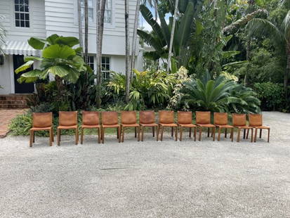SET OF 12 - CAB 412 Chairs Designed By Mario Belli: Mario Bellini 412 "CAB" dining chairs for Cassina, vintage edition inred, Italy, set of four. One of the most iconic Bellini's creations, "CAB" is the world’s first free-standing cowhide design