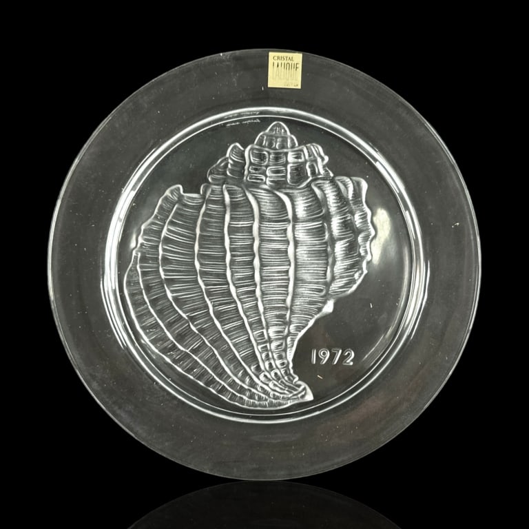 Lalique French Crystal "1972" Annual Plate: Lalique French crystal "1972" annual collector's plate. Includes original presentation box and pamphlet. Retains factory label. Etched "Lalique France" mark to bottom. Measures approx. 8 1/8" diameter