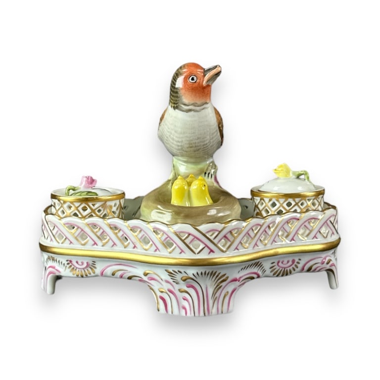 Herend Hungary hand painted double inkwell depicting the Rothschild bird with chicks. Measures: Herend Hungary hand painted double inkwell depicting the Rothschild bird with chicks. Measures approx. 4 1/2" height x 6" width x 5" depth. appears in overall good condition. JD/B:13/CB:B