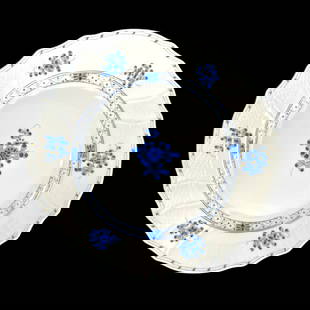 A set of 12 Herend Hungarian hand painted porcelain dinner plates in the "Blue Garden" pattern: A set of 12 Herend Hungarian hand painted porcelain dinner plates in the "Blue Garden" pattern depicting blue flowers with lattice and gilt accent. Blue stamp marks to bottom. Measures approx. 10 3/8"