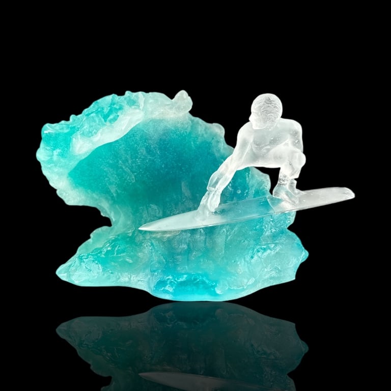Elusive Daum French Pate de Verre art glass sculpture depicting a frostes surfer on aqua tone wave.: Elusive Daum French Pate de Verre art glass sculpture depicting a frostes surfer on aqua tone wave. Signed Daum France. Measures approx. 6 1/2" height x 11 1/2" width x 7 3/4" depth. Chips and restora