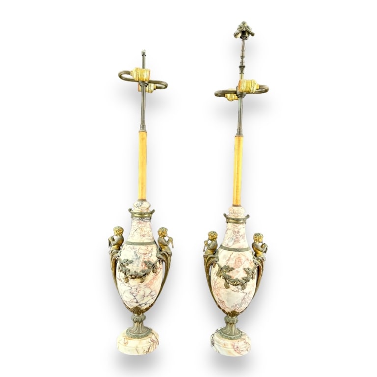 A pair of antique 19th white and rouge marble heavy lamps. Mounted with bronze depicting putti with (1 of 3)