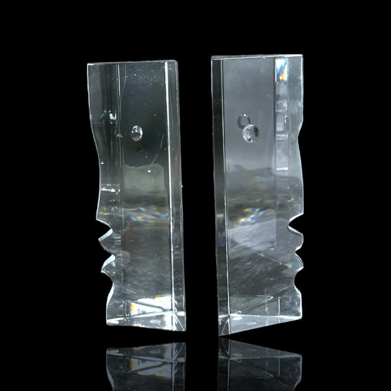 Robert Rigot (FRENCH, Born 1929) for Baccarat France, a pair of clear crystal "Encounter" faces (1 of 3)
