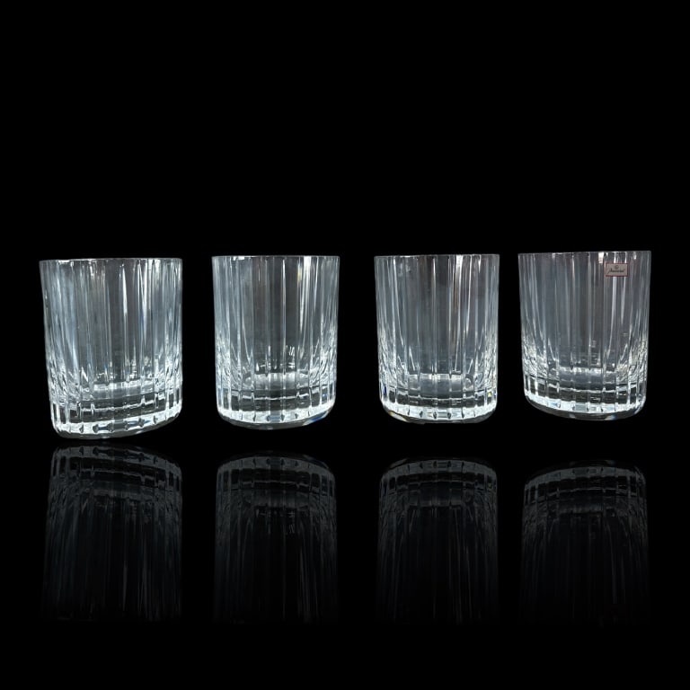 A set of Baccarat French crystal 17 ounce tumbler glasses in the "Harmonie" pattern having a: A set of Baccarat French crystal 17 ounce tumbler glasses in the "Harmonie" pattern having a pinstripe design. Includes fitted presentation boxes. Glasses measure approx. 4 3/4" height x 3 3/4" diamet