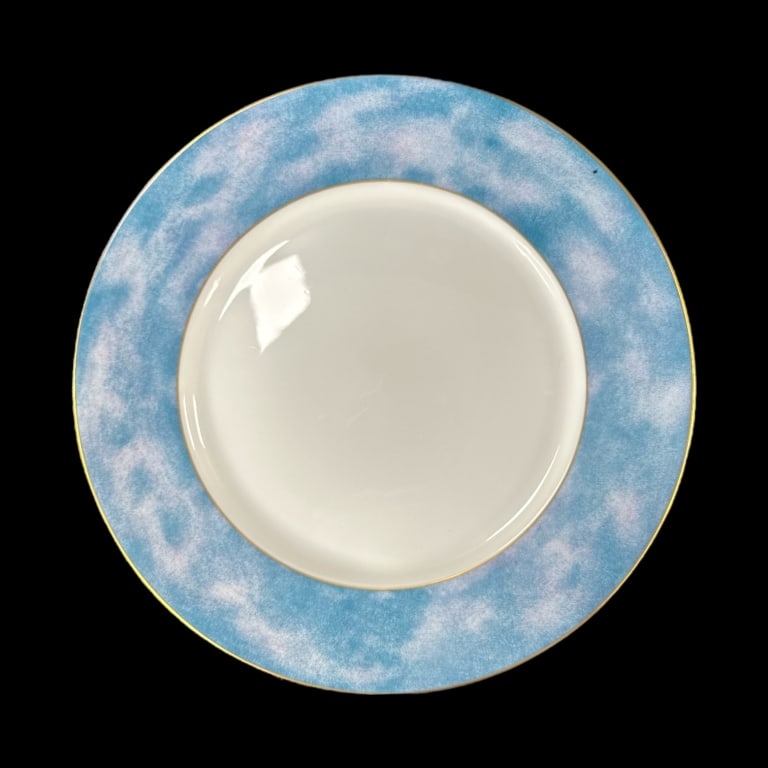 A set of 12 Richard Ginori Italian porcelain "Service Plate" chargers having powdered light blue: A set of 12 Richard Ginori Italian porcelain "Service Plate" chargers having powdered light blue rims with gilt accent. Green underglaze marks to bottoms. Each measures approx. 12 1/4" diameter. Some