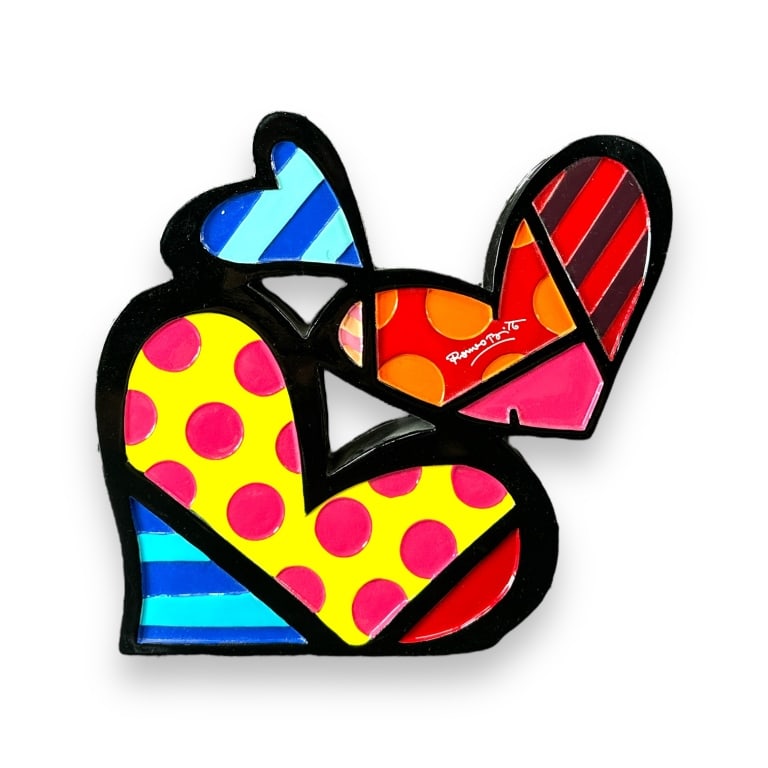 Romero Britto pop-art polystone "Cluster Of Hearts" figurine. Includes original box. Measures: Romero Britto pop-art polystone "Cluster Of Hearts" figurine. Includes original box. Measures approx. 8" height x 7" width x 3" depth. Overall good condition. JD/B15/SH:6A