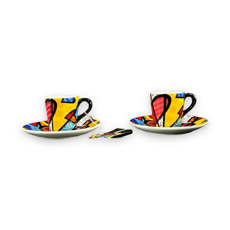 A lot of three Romero Britto pop-art porcelain "A New Day" espresso cup and saucer sets. Includes (1 of 4)