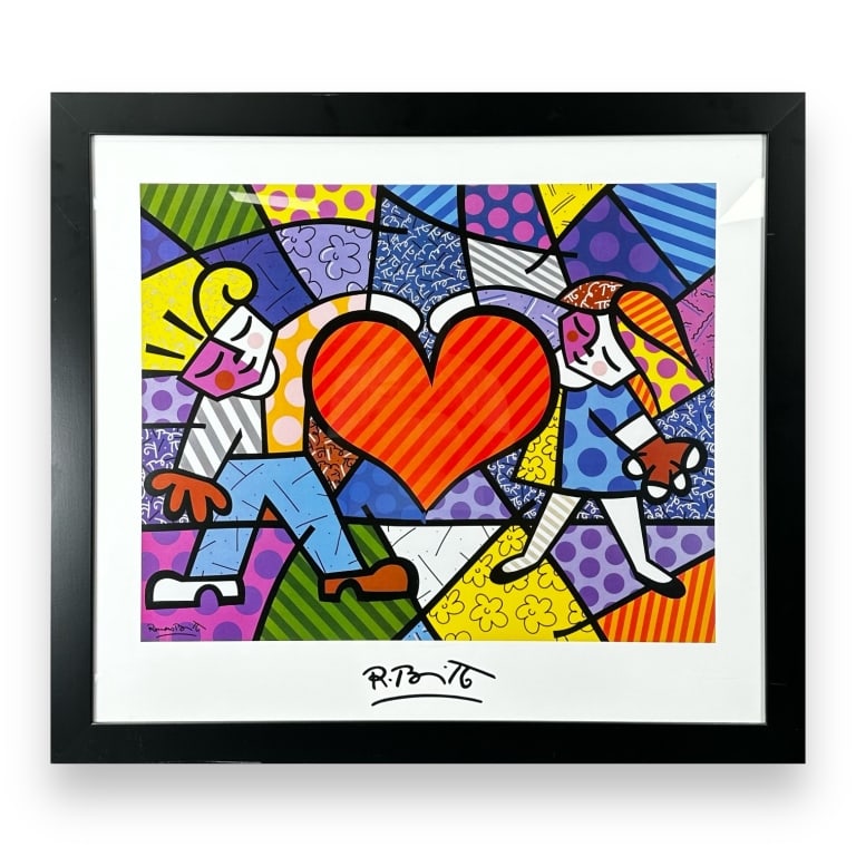Romero Britto (BRAZILIAN / UNITED STATES / FLORIDA, Born 1963) print in color on paper titled "Heart: Romero Britto (BRAZILIAN / UNITED STATES / FLORIDA, Born 1963) print in color on paper titled "Heart Kids". Signed in the print to lower left and lower center. Mounted in a black wooden frame behind a