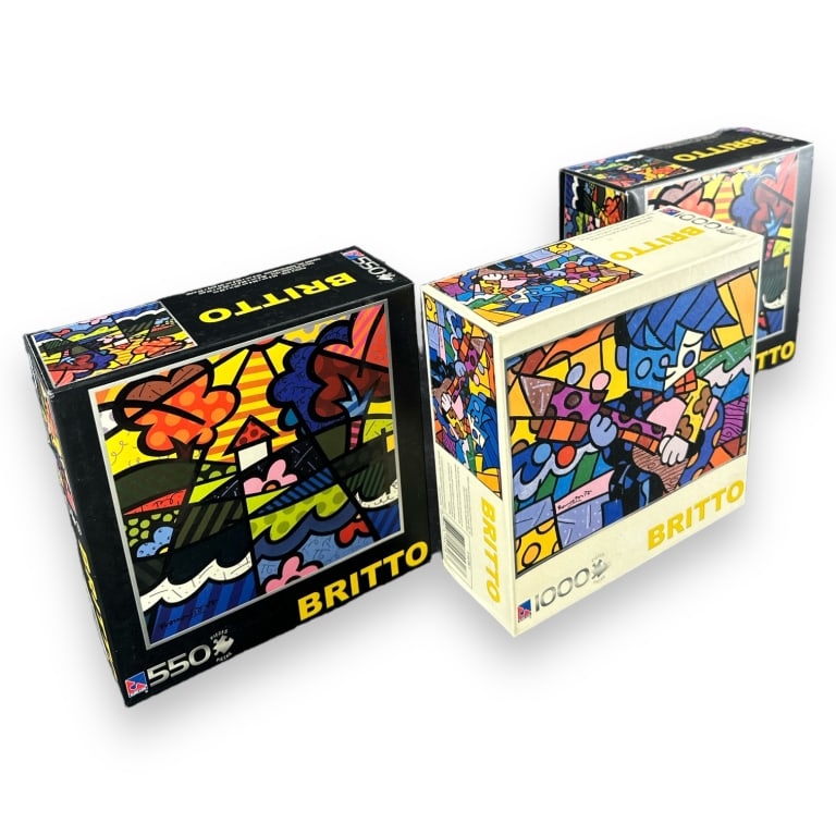 Romero Britto(Brazil, b.1963)Lot of 3 Puzzles New in box. 2 boxes: 550pcs. 1 box: 1000pcs. (1 of 4)
