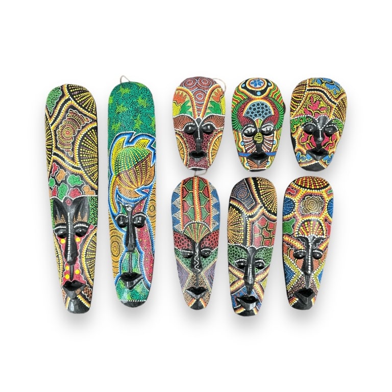 A lot of 8 Boho style hand painted colorful African Aboriginal Australia wooden masks with dot: A lot of 8 Boho style hand painted colorful African Aboriginal Australia wooden masks with dot patterns. Tallest measures approx. 20" height and shortest measures approx. 8" height. Overall good condi