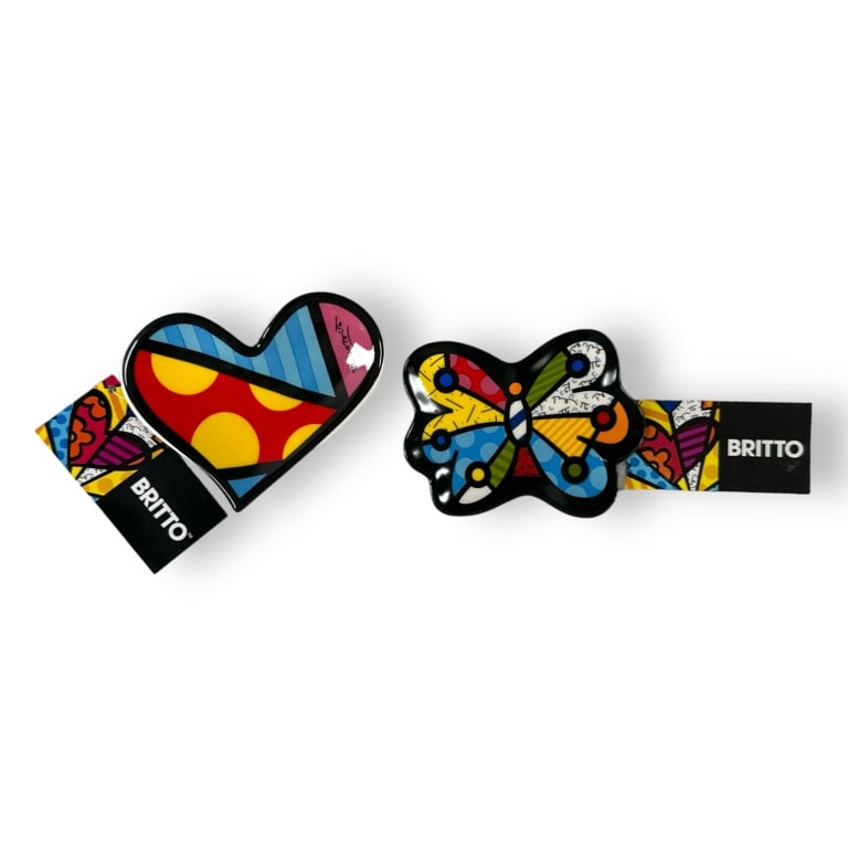 A lot of 11 Romero Britto Giftcraft pop art ceramic tea bag holder dishes. Includes original boxes.: A lot of 11 Romero Britto Giftcraft pop art ceramic tea bag holder dishes. Includes original boxes. Each approx. 3 1/2". Appear unused. EF/B15/SH:15A