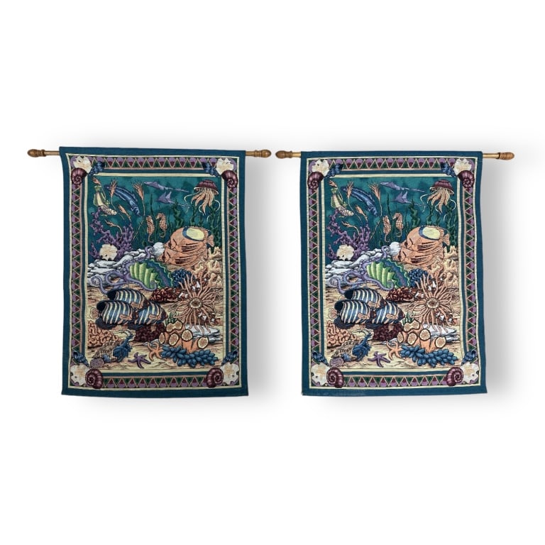 A pair of contemporary wall tapestries depicting sea life. Includes wooden handing rods for each (1 of 3)