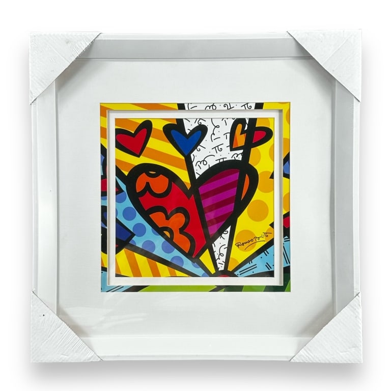 Romero Britto "A New Day" poster print mounted in a white lacquer frame with mat accent. Still in (1 of 5)