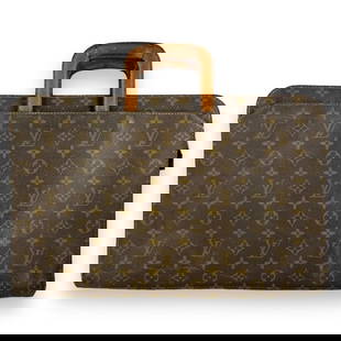 Vintage Louis Vuitton classic brown leather jacquard monogram document briefcase bag with hideaway: Vintage Louis Vuitton classic brown leather jacquard monogram document briefcase bag with hideaway handles. Measures approx. 11" height x 17" width x 2 3/4" depth. Shows wear consistent with age and u